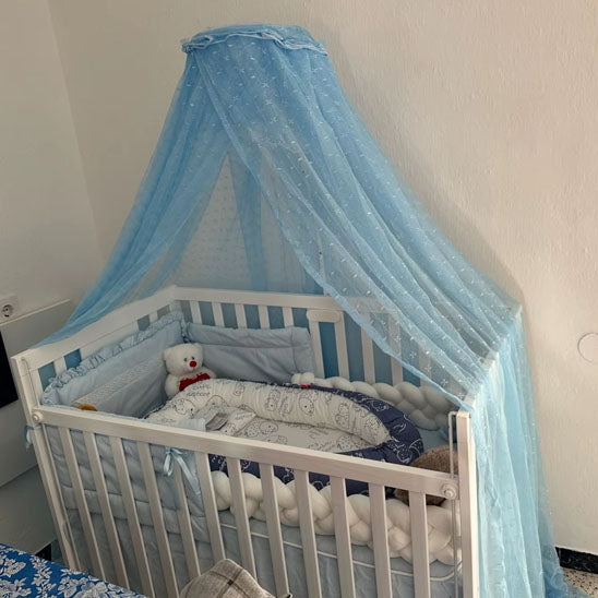 beau ciel de lit bleu